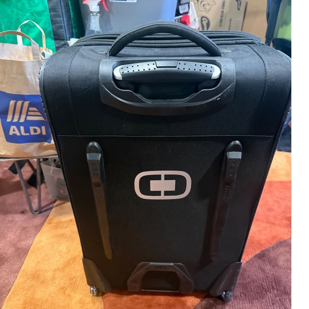 OGIO Black Rolling Suitcase Softshell Upright Travel Bag with Telescoping Handle